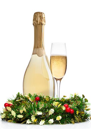 simsearch:400-04265369,k - Bottle and glass of champagne with christmas decoration on white background Foto de stock - Super Valor sin royalties y Suscripción, Código: 400-09082852