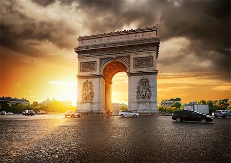 Cloudy sky and Arc de Triomphe in Paris, France Photographie de stock - Aubaine LD & Abonnement, Code: 400-09083274