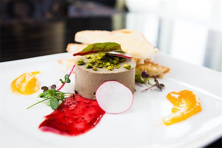 Chicken liver pate with croutons and slices of radish Stock Photo - Budget Royalty-Free & Subscription, Code: 400-09083355