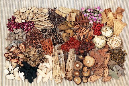 simsearch:400-06521200,k - Traditional chinese herbs used in alternative herbal medicine on bamboo background. Top view. Stock Photo - Budget Royalty-Free & Subscription, Code: 400-09083381