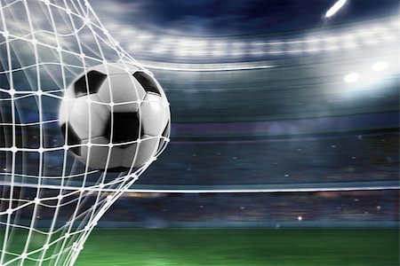 simsearch:400-09032434,k - Ball scores a goal on the net in a football match Stockbilder - Microstock & Abonnement, Bildnummer: 400-09083575