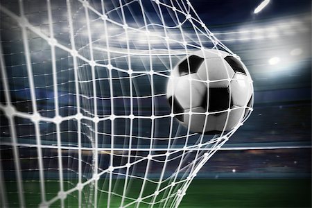 simsearch:400-09032434,k - Ball scores a goal on the net in a football match Stockbilder - Microstock & Abonnement, Bildnummer: 400-09083698