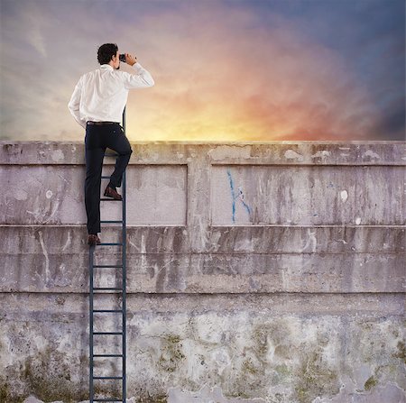 simsearch:400-05142003,k - Businessman on a stairs looks far for new business Photographie de stock - Aubaine LD & Abonnement, Code: 400-09083701