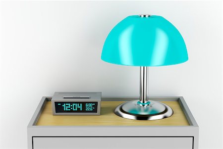 Digital alarm clock and electric lamp on modern nightstand Stock Photo - Budget Royalty-Free & Subscription, Code: 400-09095379