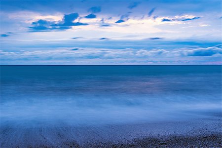 photos of ominous sea storms - Dark evening sky above the sea at stormy time. Stock Photo - Budget Royalty-Free & Subscription, Code: 400-09095858