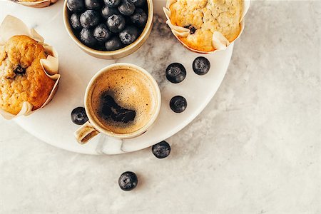 photos of blueberries for kitchen - Cup of coffee and Homemade muffins. Food background with copy space for your text. Foto de stock - Super Valor sin royalties y Suscripción, Código: 400-09097155