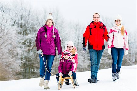 simsearch:400-09136205,k - Family with kids having winter walk in snow with fun Stockbilder - Microstock & Abonnement, Bildnummer: 400-09091294
