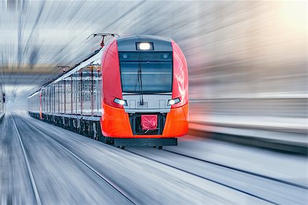 serjiob74 (artist) - Modern high-speed train moves fast at winter evening time. Photographie de stock - Aubaine LD & Abonnement, Code: 400-09115472