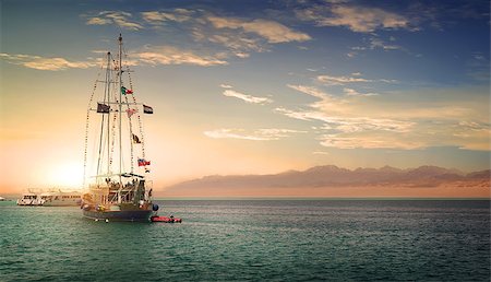Sailboat and yachts in the sea at sunny sunset Stock Photo - Budget Royalty-Free & Subscription, Code: 400-09116175