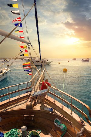 Sailboat in red sea at the sunset Stock Photo - Budget Royalty-Free & Subscription, Code: 400-09116176