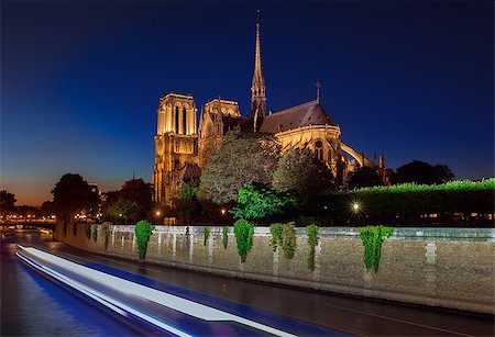 simsearch:862-06541698,k - Notre Dame cathedral at night in Paris, France Photographie de stock - Aubaine LD & Abonnement, Code: 400-09117769