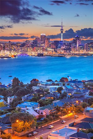 simsearch:400-08792649,k - Cityscape image of Auckland skyline, New Zealand during sunset with the Davenport in the foreground. Foto de stock - Super Valor sin royalties y Suscripción, Código: 400-09119651