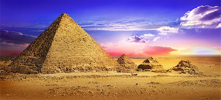 simsearch:400-08336472,k - Pyramids in desert under ultra violet clouds Stock Photo - Budget Royalty-Free & Subscription, Code: 400-09112539