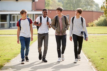 simsearch:400-09122044,k - Group Of Male Teenage Students Walking Around College Campus Stock Photo - Budget Royalty-Free & Subscription, Code: 400-09121941
