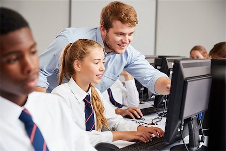 simsearch:400-09121964,k - Teenage Students Wearing Uniform Studying In IT Class Stock Photo - Budget Royalty-Free & Subscription, Code: 400-09121958