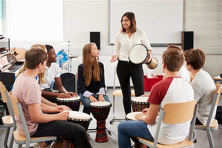 simsearch:400-09121964,k - Teenage Students Studying Percussion In Music Class Stock Photo - Budget Royalty-Free & Subscription, Code: 400-09121974