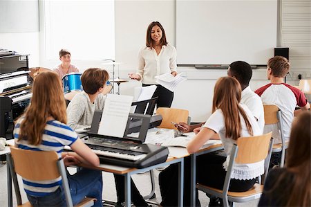simsearch:400-09121964,k - Teenage Students Studying In Music Class With Female Teacher Stock Photo - Budget Royalty-Free & Subscription, Code: 400-09121971