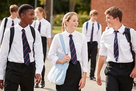 simsearch:400-09122044,k - Group Of Teenage Students In Uniform Outside School Buildings Stock Photo - Budget Royalty-Free & Subscription, Code: 400-09122020