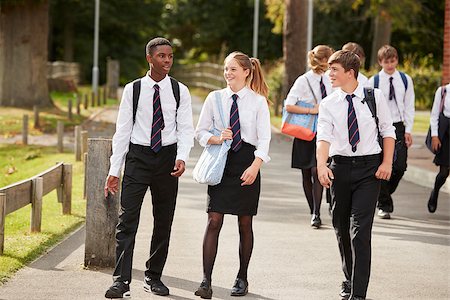 Group Of Teenage Students In Uniform Outside School Buildings Stock Photo - Budget Royalty-Free & Subscription, Code: 400-09122021