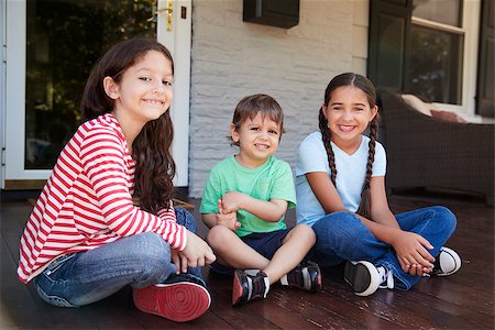 pictures people sitting front steps house - Portrait Of Children Sitting On Porch Of House Together Stock Photo - Budget Royalty-Free & Subscription, Code: 400-09122473