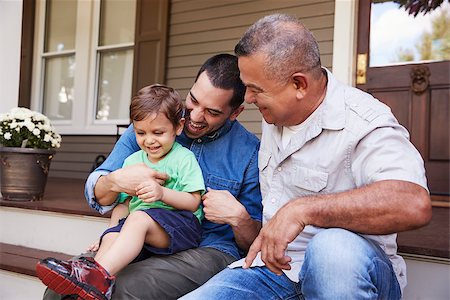 quartiere latino - Male Multi Generation Family Sitting On Steps in Front Of House Photographie de stock - Aubaine LD & Abonnement, Code: 400-09122535