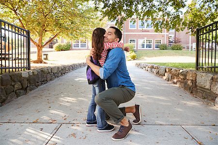 daughter is going to school - Father Dropping Off Daughter In Front Of School Gates Stock Photo - Budget Royalty-Free & Subscription, Code: 400-09122583