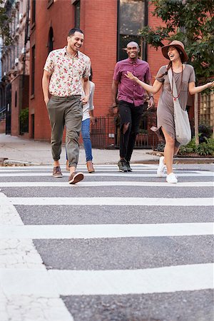 stooped man walking - Group Of Friends Crossing Urban Street In New York City Stock Photo - Budget Royalty-Free & Subscription, Code: 400-09122661