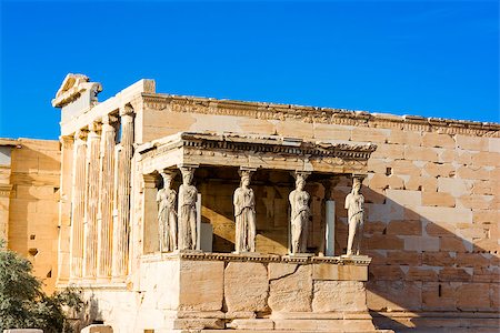 simsearch:400-06922893,k - The Porch of the Caryatids at the Erechtheion temple on the Acropolis, Athens, Greece. Six columns sculpted as figures of maidens in place of ordinary columns. Stock Photo - Budget Royalty-Free & Subscription, Code: 400-09140432