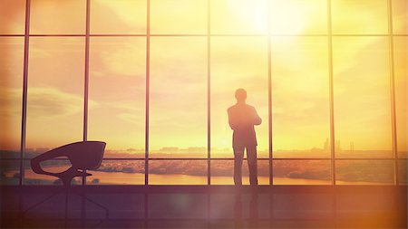 simsearch:400-08812456,k - Silhouette of a man in a huge office in front of large windows. Stock Photo - Budget Royalty-Free & Subscription, Code: 400-09141017