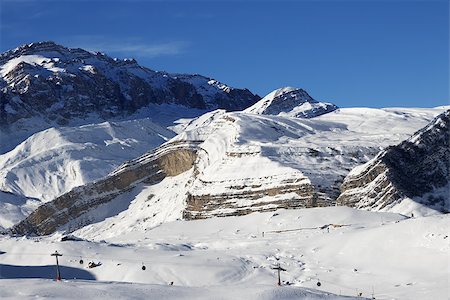 simsearch:400-05071386,k - Ski resort at sunny day. Greater Caucasus, Mount Shahdagh. Qusar rayon of Azerbaijan. Fotografie stock - Microstock e Abbonamento, Codice: 400-09170511