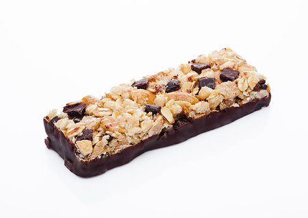 simsearch:400-09238081,k - Chocolate protein cereal energy bar on white background Photographie de stock - Aubaine LD & Abonnement, Code: 400-09185921