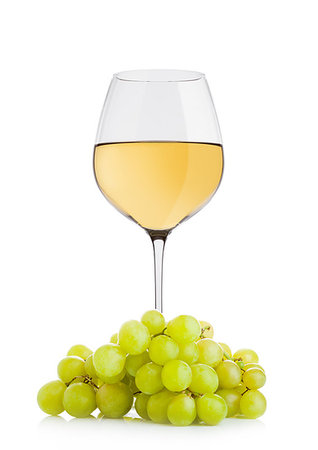 simsearch:400-03992643,k - Glass of white wine with green grapes on white background Stock Photo - Budget Royalty-Free & Subscription, Code: 400-09185936