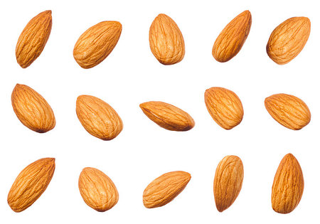 simsearch:400-06788551,k - Raw almonds nuts different shape isolated on white background Foto de stock - Super Valor sin royalties y Suscripción, Código: 400-09185937
