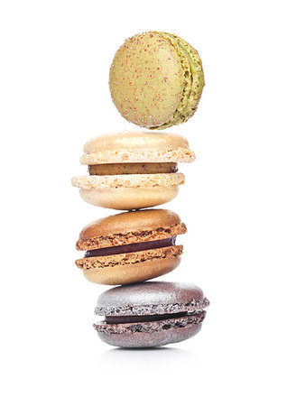 French luxury colorful macarons dessert cakes on white background with sugar on top Stock Photo - Budget Royalty-Free & Subscription, Code: 400-09185990