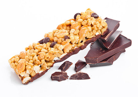 simsearch:400-09238081,k - Chocolate protein cereal energy bar dark chocolate on white background Photographie de stock - Aubaine LD & Abonnement, Code: 400-09186015