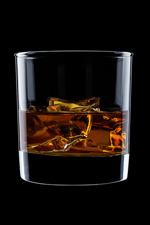simsearch:400-04569088,k - Elegant glass of whiskey with ice cubes isolated on black background Photographie de stock - Aubaine LD & Abonnement, Code: 400-09186034