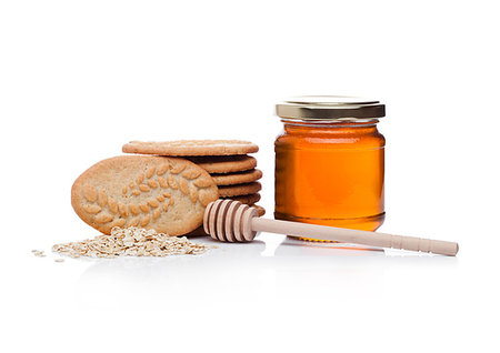 simsearch:400-09186057,k - Healthy bio breakfast grain biscuits with honey and raw oat porridge on white background Foto de stock - Super Valor sin royalties y Suscripción, Código: 400-09186059