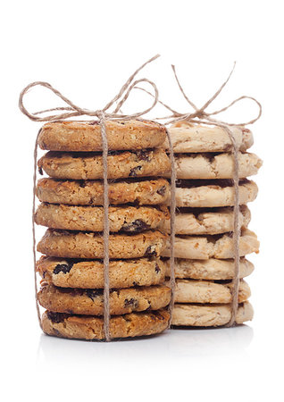 Gluten free oatmeal chocolate and caramel cookies on white background Foto de stock - Super Valor sin royalties y Suscripción, Código: 400-09186158