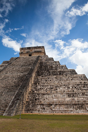 pyramid of the magician - Majestic ruins in Chichen Itza,Mexico.Chichen Itza is a complex of Mayan ruins. A massive step pyramid, known as El Castillo or Temple of Kukulcan, dominates the ancient city. Stock Photo - Budget Royalty-Free & Subscription, Code: 400-09193371