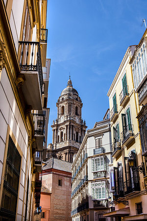 Malaga Cathedral tower from old town streets, Spain Stockbilder - Microstock & Abonnement, Bildnummer: 400-09224028