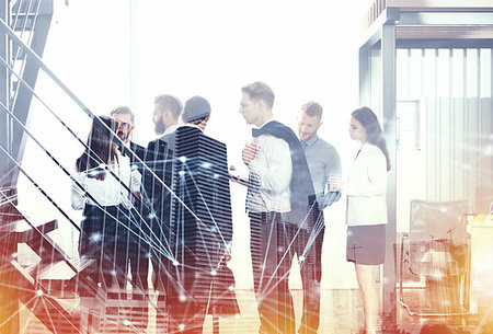 Business people work together in office with skyscraper on background with internet network effects. Concept of teamwork and partnership. double exposure Stock Photo - Budget Royalty-Free & Subscription, Code: 400-09224694