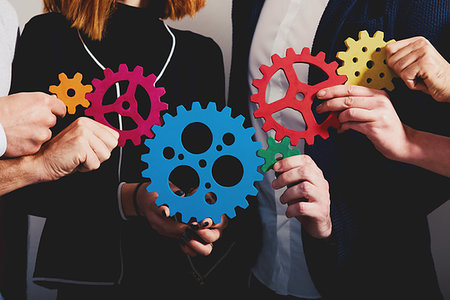 Teamwork of businesspeople work together and combine pieces of gears. Partnership and integration concept Stock Photo - Budget Royalty-Free & Subscription, Code: 400-09224699