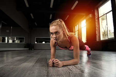 simsearch:400-08505882,k - Determined blonde girl working out at a gym Stock Photo - Budget Royalty-Free & Subscription, Code: 400-09224724