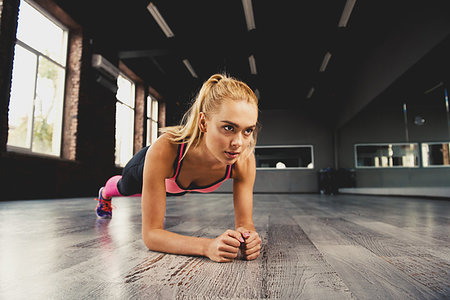 simsearch:400-08505882,k - Determined blonde girl working out at a gym Stock Photo - Budget Royalty-Free & Subscription, Code: 400-09224725