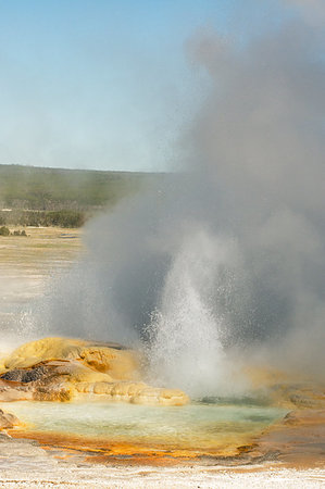simsearch:400-05015574,k - Spasm Geyer erupting and fuming in Fountain Paint Pots area in Yellowstone National Park, Wyoming Stock Photo - Budget Royalty-Free & Subscription, Code: 400-09225559