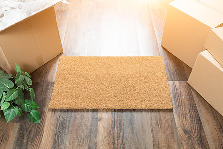 door mat welcome - Blank Welcome Mat, Moving Boxes and Plant on Hard Wood Floors. Stock Photo - Budget Royalty-Free & Subscription, Code: 400-09225958