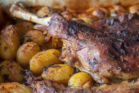 Delicious lamb shoulder, roasted with whole potatoes. Stock Photo - Budget Royalty-Free & Subscription, Code: 400-09220919