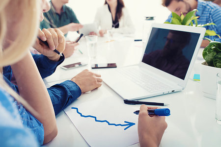 financial meeting tablet - Team of people works together on company statistics in office. Concept of teamwork and partnership Stock Photo - Budget Royalty-Free & Subscription, Code: 400-09221128