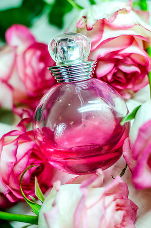 simsearch:700-06892568,k - a bottle of perfume among beautiful flowers Stock Photo - Budget Royalty-Free & Subscription, Code: 400-09221156