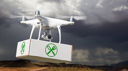 plane rain - Unmanned Aircraft System (UAV) Quadcopter Drone Carrying Package With Food Symbol Label Near Stormy Skies. Stock Photo - Budget Royalty-Free & Subscription, Code: 400-09221217